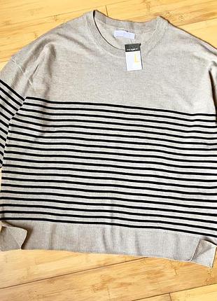 Легкий бежевий светр-оверсайз з шерстю