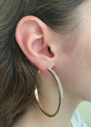 Великі сережки кільця в позолоті з цирконами