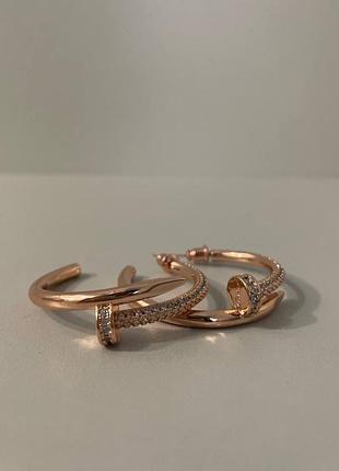 Брендові сережки в рожевому золоті з цирконами