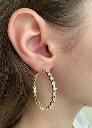 Сережки в позолоті з камінцями