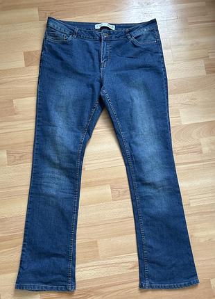 Джинси з потертостями