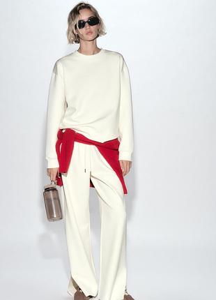 Брюки zara з розмірами, спортивні штани zara з розрізами, широкі білі штани з розрізами zara, zara interlock joggers