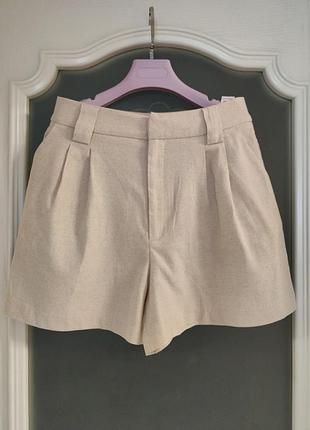 Нарядные бежевые женские шорты с карманами