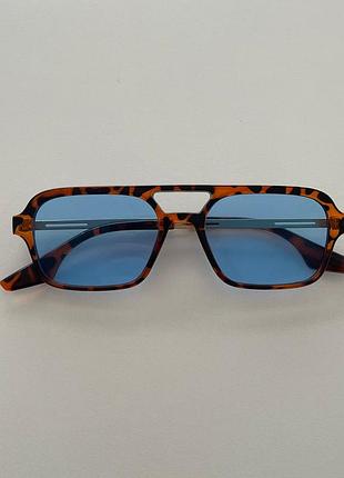 Сонцезахисні окуляри з леопардовою оправою та блакитними лінзами uv400