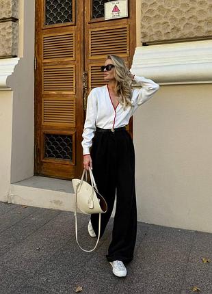 Брюки брюки палаццо высокой посадки с глубокими защипами