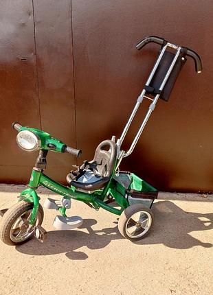 Дитячий самокат з батьківською ручкою.