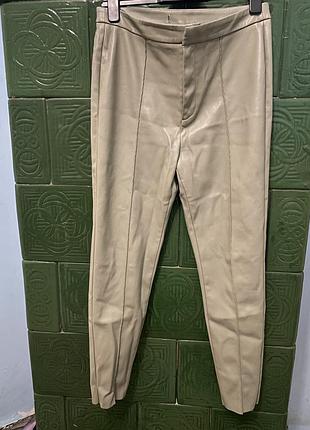 Брюки искусственная кожа 46 м оливковый цвет