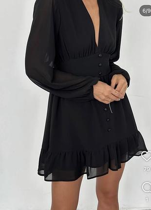 Жіноча чорна сукня