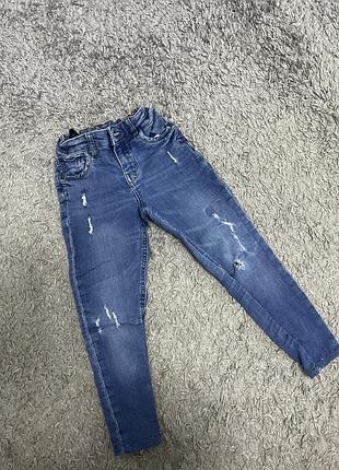 Джинсы протертые