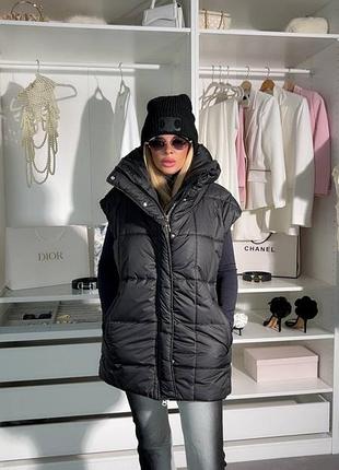 Теплая женская удлиненная жилетка