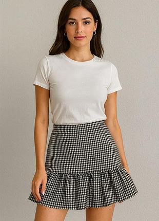 Чорно-біла спідниця-шорти у принт «гусяча лапка» з воланом