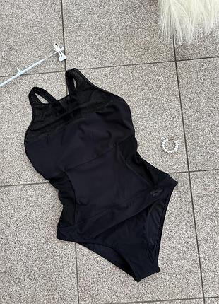 Новий суцільний купальник arena