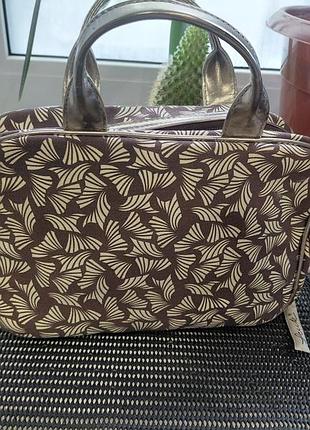 Косметичка дорожня