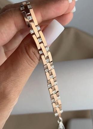 Срібний браслет з золотими пластинами