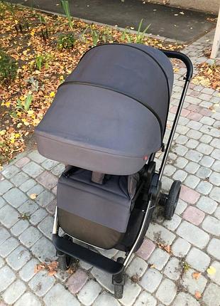 Прогулянковий коляска з реверсивним блоком