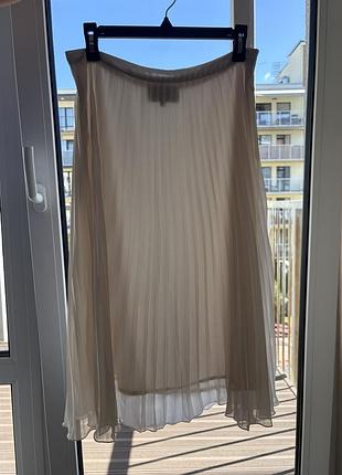 Спідниця плісе молочного кольору