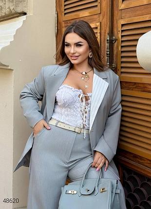 Жіночий оверсайз піджак з акцентним лацканом великих розмірів сірий