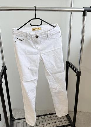 Белые трикотажные джинсы размер на с м и л