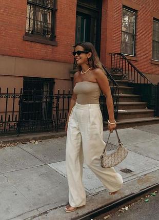 Легкие брюки палаццо с высокой посадкой цвета сливочного масла