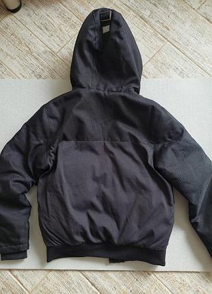 Тепла куртка next