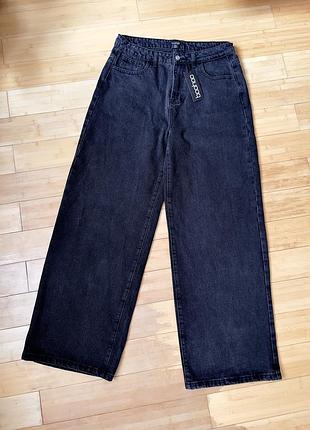 Чорно-сірі широкі джинси