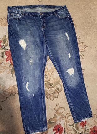Стильные зауженные джинсы с драностями рваные с бахромой мега батал janina нитевичка