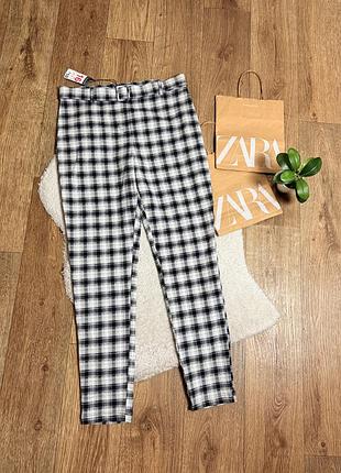 Класичні брюки у клітинку нові