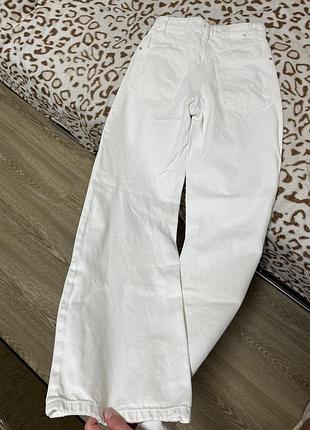 Джинси білі с розрізами