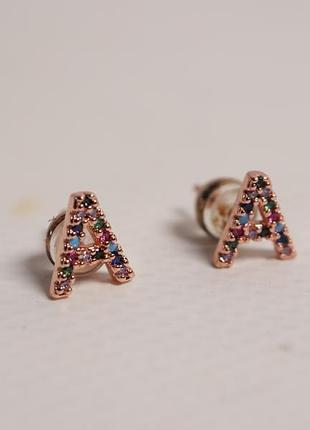 Серьги в виде буквы а с камушками
