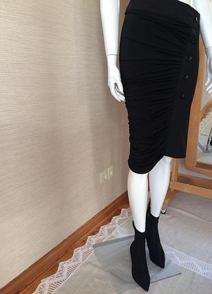 Вечерняя черная емкая юбка behcetti.