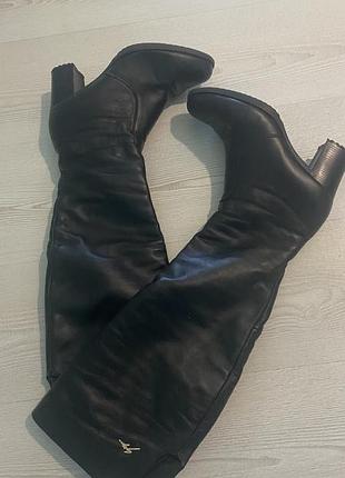 Високі чобітки