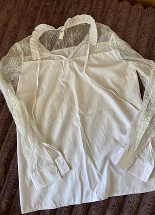 Біла блуза