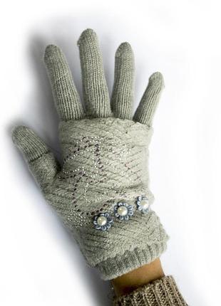Жіночі в'язані рукавички