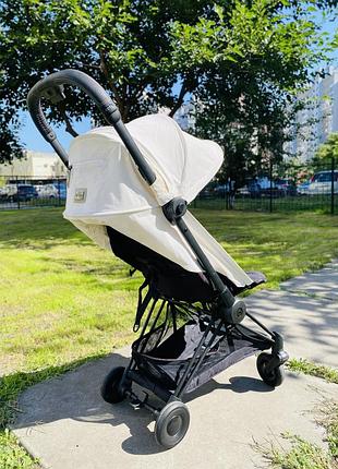 Коляска прогулянкова cybex coya off white шасі matt black