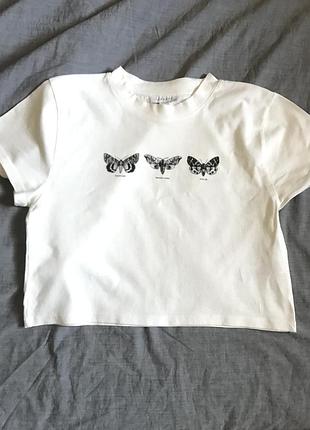 Коротка базова молочна футболка розмір м