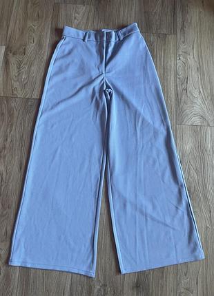 Брюки жіночі широкі блакитного кольору на л розмір.