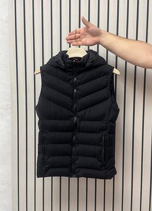 Стьобанна жилетка з капюшоном унісекс