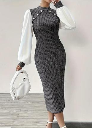 Жіноча сукня , яка підкорює з першого погляду . ідеально сідає по фігурі, підкреслює жіночі лінії.контраст сірого та білого виглядає стильно.