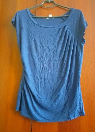 Футболка без рукавов.