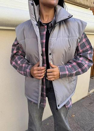 Жіноча утеплена жилетка