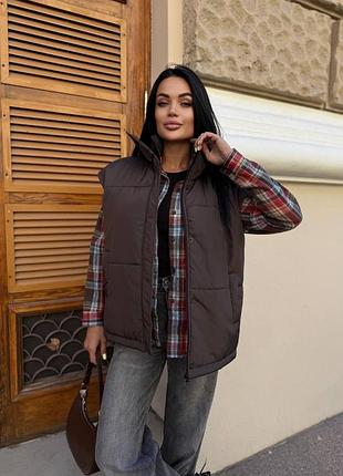 Жіноча жилетка