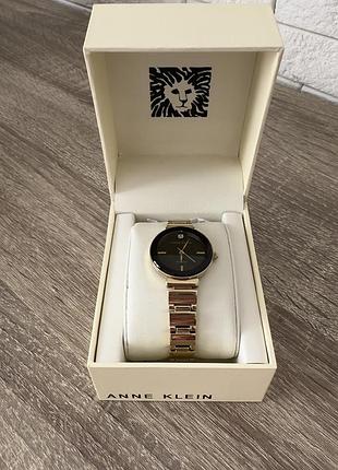 Годинник anne klein зі справжнім діамантом всередині циферблату
