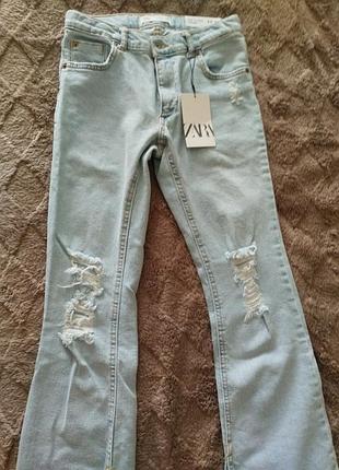 Джинсы с потертостями, 10-11 р. девочку.