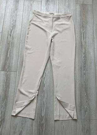 Брюки штани розріз