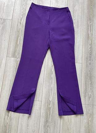 Штани брюки з розрізом