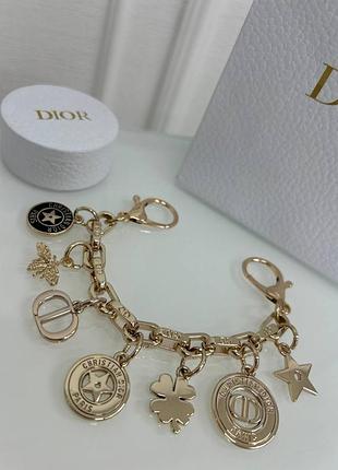 Золотой брелок клевер звезда на сумку