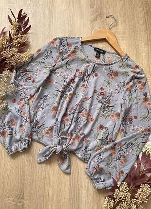 Блузка на зав’язки з пишними рукавами у квітковий принт