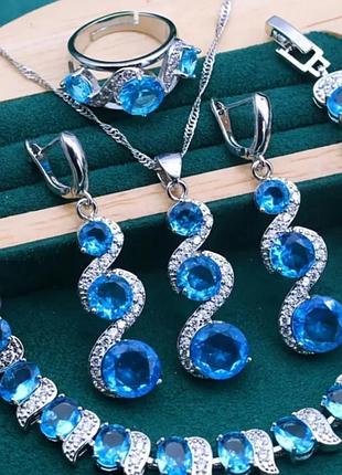 Набір з блакитними топазами925