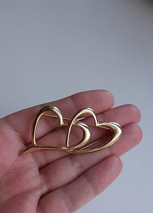 Брошь два сердца