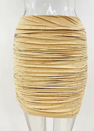 Бежева спідниця в камнях стразах жатка